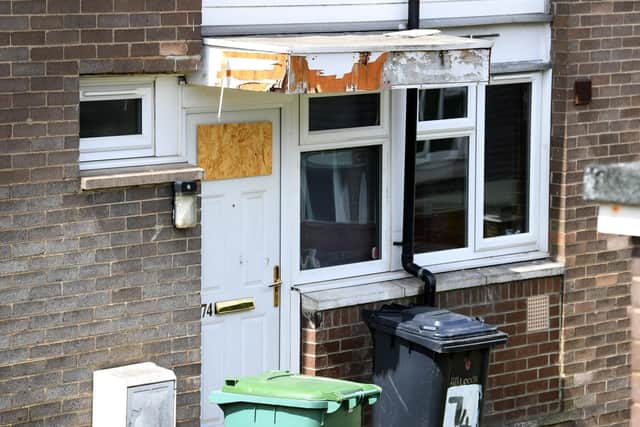 Damage to the front door of the house (Photo: Simon Hulme)