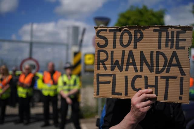 Demonstrators at a removal centre at Gatwick protest against plans to send migrants to Rwanda (Photo: PA Wire/Victoria Jones)