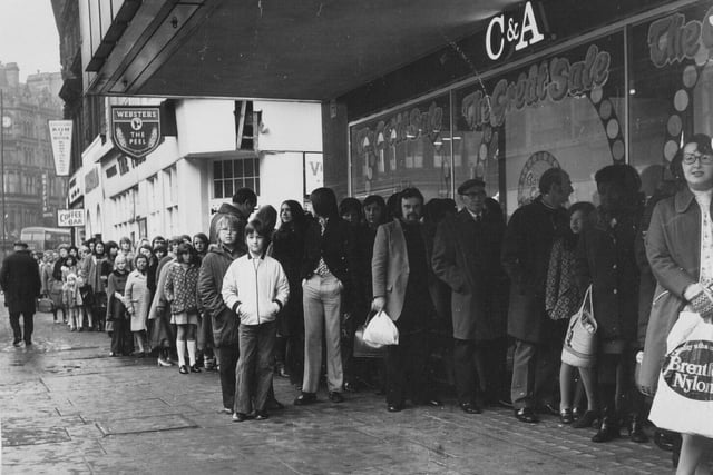 The queue for the start of the sales at C&A in Leeds city centre in January 1973.