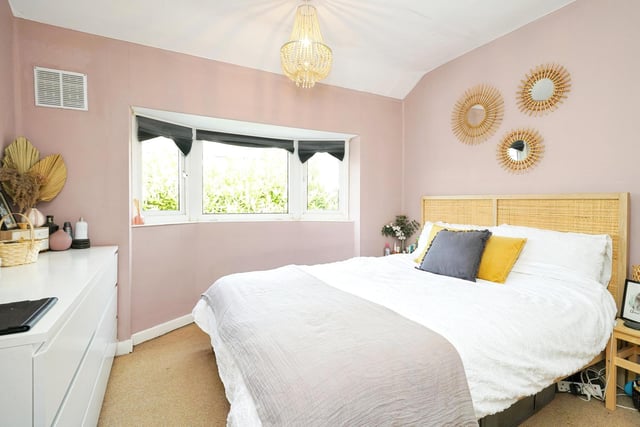 The first floor landing has doors leading to the three bedrooms and bathroom with access to the loft via hatch. The superbly decorated double bedroom has a window to the side elevation and space for wardrobes if desired.
