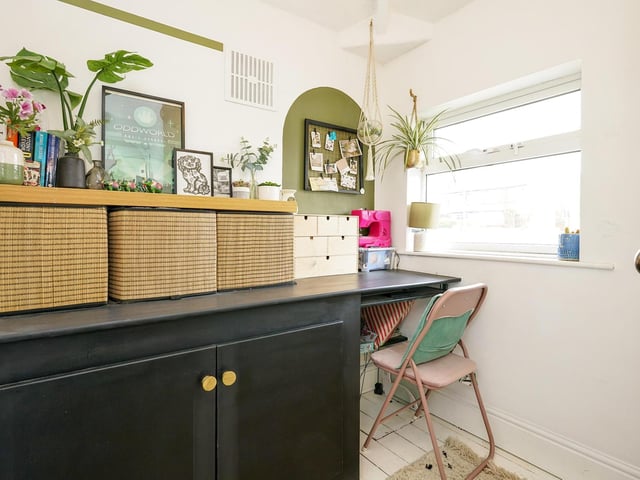 The smallest of the three bedrooms is perfect for a home office or nursery.