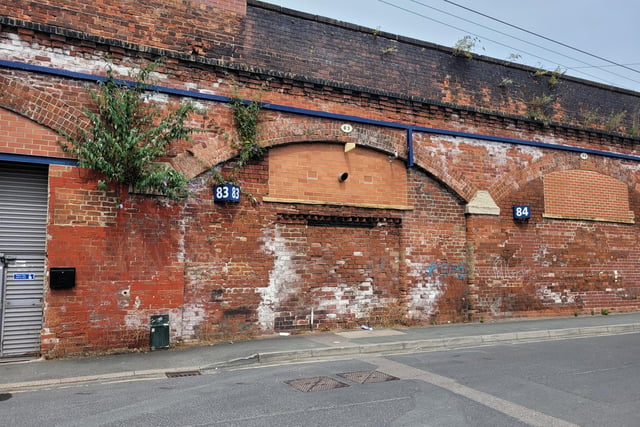 Many of the arches under the former platform on Railway Street have been repurposed - it is likely one of the entrances to the station could have been in one of these. (Pic: Richard Beecham)