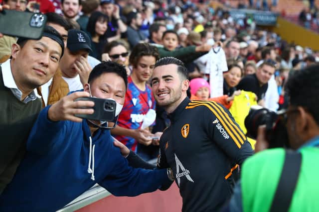GLOBAL APPEAL: Whites winger Jack Harrison poses for photographs with fans after Sunday's clash against Aston Villa at the Suncorp Stadium in Brisbane as part of Leeds United's pre-season tour of Australia. Photo by Chris Hyde/Getty Images.
