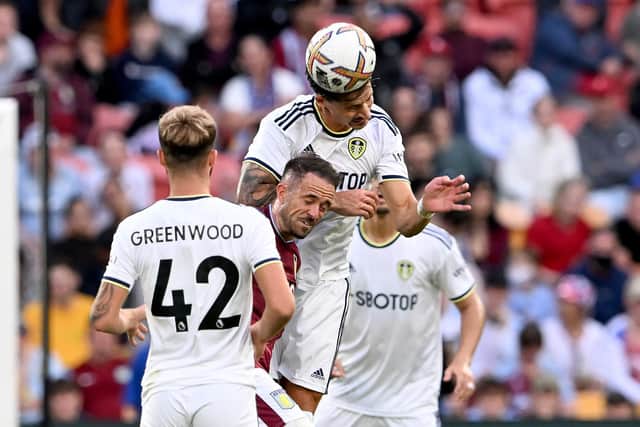 'GOING FOR IT': Aston Villa striker Danny Ings battles it out with Leeds United defender Robin Koch during Sunday's pre-season friendly against the Whites in Brisbane. Photo by Bradley Kanaris/Getty Images.