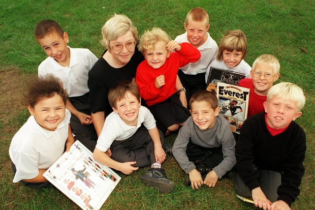 Headteacher Ann Tomkins with pupils at Clapgate Primary in September 1999 who did not miss a day's attendance during the last school year. They were rewarded with tokens for books..