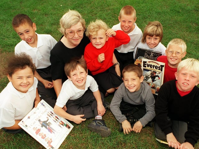Headteacher Ann Tomkins with pupils at Clapgate Primary in September 1999 who did not miss a day's attendance during the last school year. They were rewarded with tokens for books..