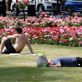 People enjoy the sunshine in Park Square as the country swelters in a heatwave.