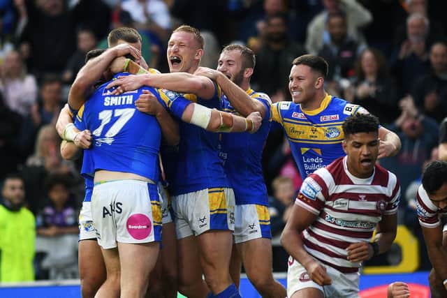 LeedsRhinos players celebrate after Cameron Smith's try against Wigan Warriors last week. Picture: Jonathan Gawthorpe.