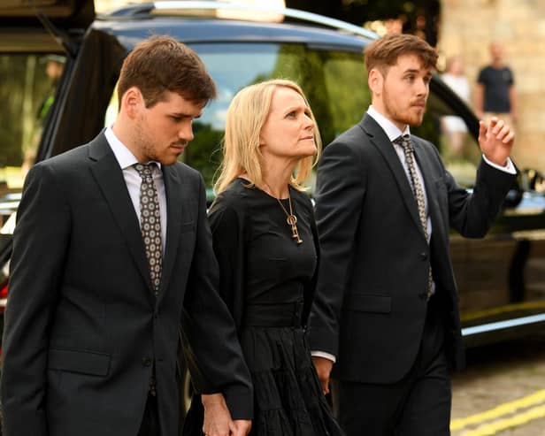 The funeral of much-loved presenter Harry Gration took place at York Minster today, Pictured is his wife Helen and their two children Harrison and Harvey.