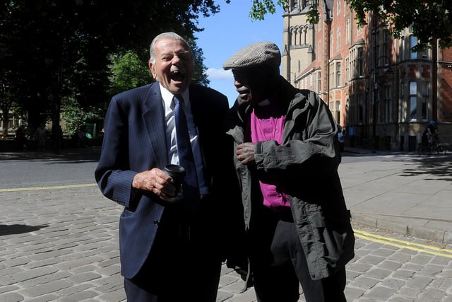 Former cricket umpire Dickie Bird (left) and Lord John Sentamu arrive at a service of thanksgiving for BBC presenter Harry Gration at York Minster in York