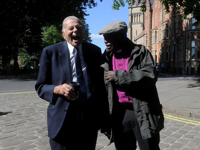 Former cricket umpire Dickie Bird (left) and Lord John Sentamu arrive at a service of thanksgiving for BBC presenter Harry Gration at York Minster in York
