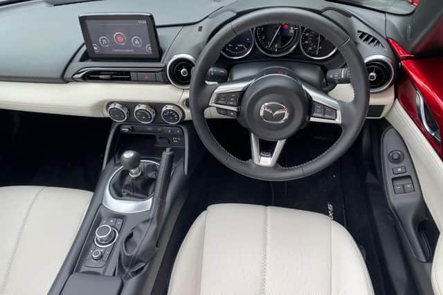 The MX-5 is a sharp handler but the cabin is comfortable