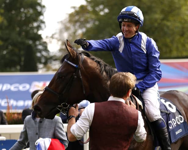 Unbeaten: Jockey Jim Crowley celebrates with Baaeed after winning the Queen Elizabeth II Stakes at Ascot last year - one of nine straight wins for the horse. Picture: Steven Paston/PA