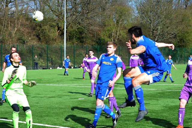 Loz Power heads home the second goal for Horsforth St Margaret's in the 2-0 win over Leeds Medics & Dentists. Picture: Steve Riding.