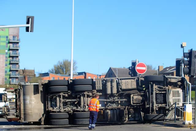 The overturned lorry (photo: Danny Lawson / PA Wire).