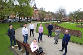 Andrew Fairburn (sitting on bench) and some of the RWO team who have moved to larger offices to accommodate growth and demand for services