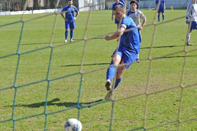 Lee Turner scores from the penalty spot for HT Sports against top-of-the-table rivals Kirkstall Crusaders. Picture: Steve Riding.