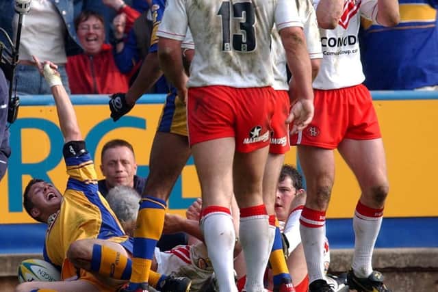 Danny McGuire touches down for Leeds in the 2003 semi-final agianst Saints. Picture by Steve Riding.