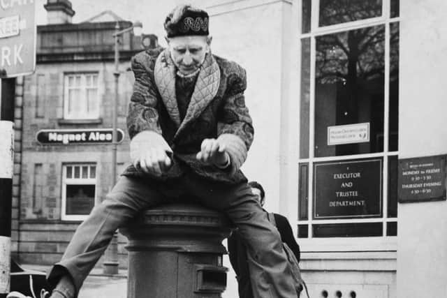 Batley's famous high flyer George Corner, vaults over a pillar box in Commercial Street in Janaury 1973. He was 73 years old at the time.