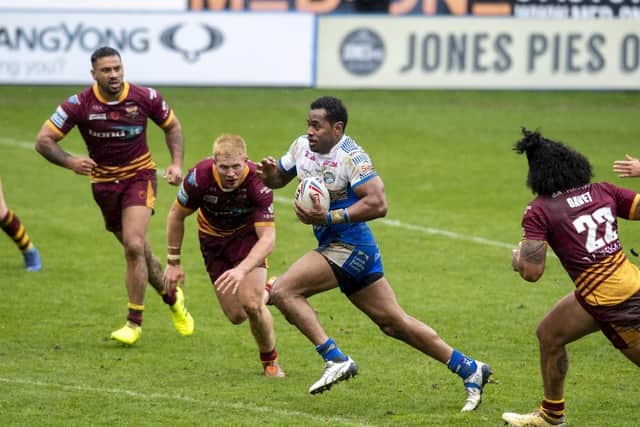 King Vuniyayawa, pictured in pre-season acrtion against Huddersfield, is in contention for his Rhinos debut. Picture by Tony Johnson.