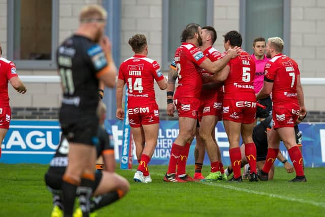 Hull KR celebrate Jordan Abdull's try which put then 32-16 ahead in the 62nd minute. (BRUCE ROLLINSON)