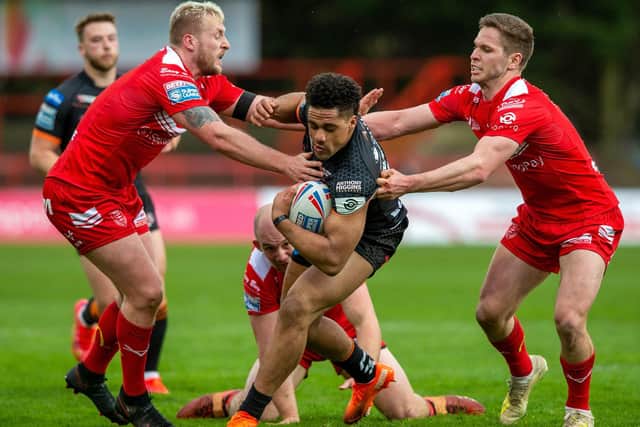 Castleford Tigers' Derrell Olpherts takes on Hull KR (BRUCE ROLLINSON)
