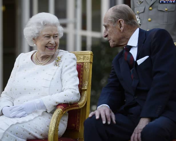 File photo dated 05/06/14 of Queen Elizabeth II and the Duke of Edinburgh attending a garden party in Paris, hosted by Sir Peter Ricketts, Britain's Ambassador to France ahead of marking the 70th anniversary of the D-Day landings during World War II. Issue date: Friday April 9, 2021. (credit: PA).