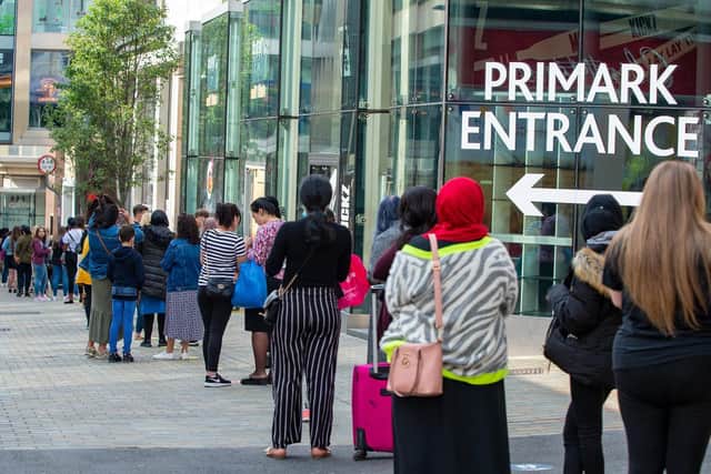 Shoppers queuing for Primark in Leeds last June when non-essential retailers reopened after the first national lockdown. Picture: Bruce Rollinson