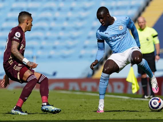 KEY BATTLE - Benjamin Mendy struggled with Leeds United winger Raphinha's pace before being replaced by Pep Guardiola and taking up the role of chief protester of time-wasting on the Manchester City bench. Pic:Getty