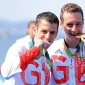 Great Britain's Alistair, right, and Jonny Brownlee with their gold and silver medals at the Rio Olympics. Picture: PA