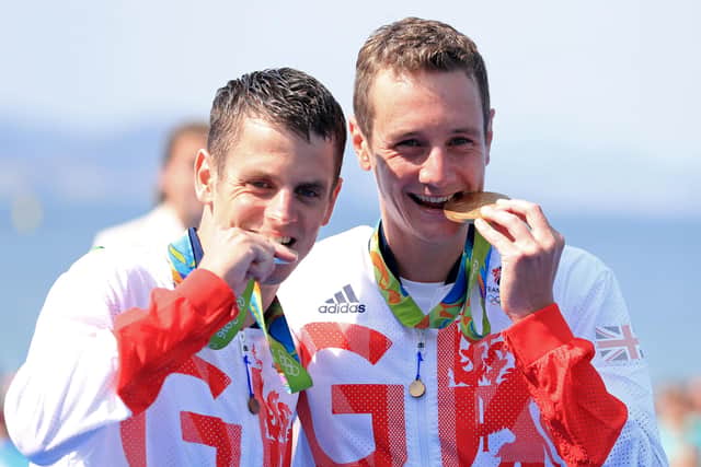 Great Britain's Alistair, right, and Jonny Brownlee with their gold and silver medals at the Rio Olympics. Picture: PA