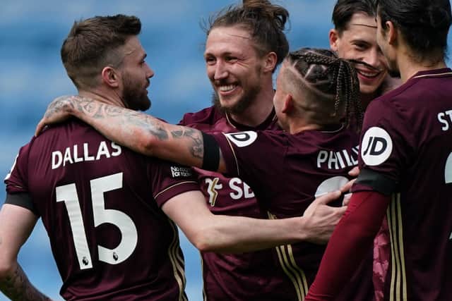 ALMOST THERE: Leeds United are on the verge of mathematical safety following Saturday's superb 2-1 success at Manchester City thanks to a brace from Stuart Dallas, left. Photo by TIM KEETON/AFP via Getty Images.