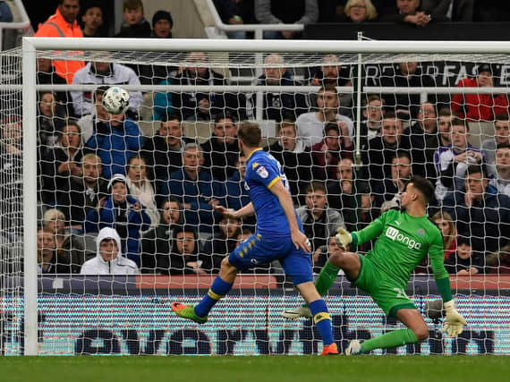Leeds United striker Chris Wood scores against Newcastle United. Pic: Getty