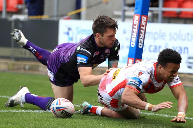 DOUBLING UP: St Helens' Regan Grace scores his side's second try against Leeds Rhinos. Picture: Mike Egerton/PA Wire.