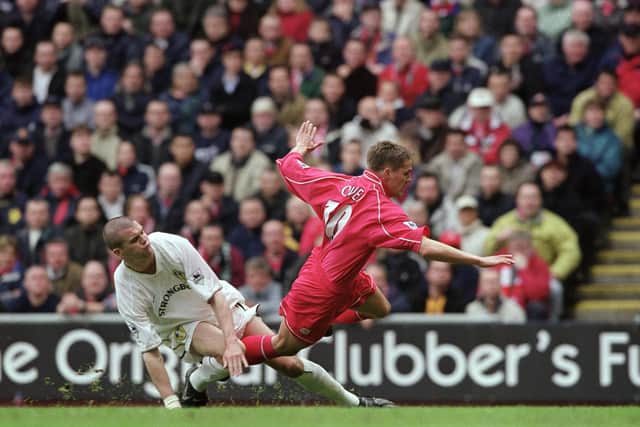 MEMORIES: Dom Matteo, left, taking on his former side and first club Liverpool for Leeds United and tangling with Michael Owen, right, in the Premiership clash at Anfield of April 2001. Photo by Clive Brunskill/Allsport via Getty Images.