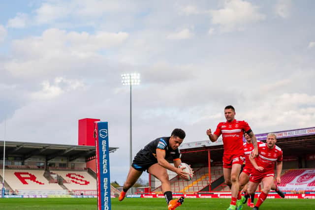 Derrell Olpherts scores in Tigers' Cup win at Hull KR. Picture by Alex Whitehead/SWpix.com.