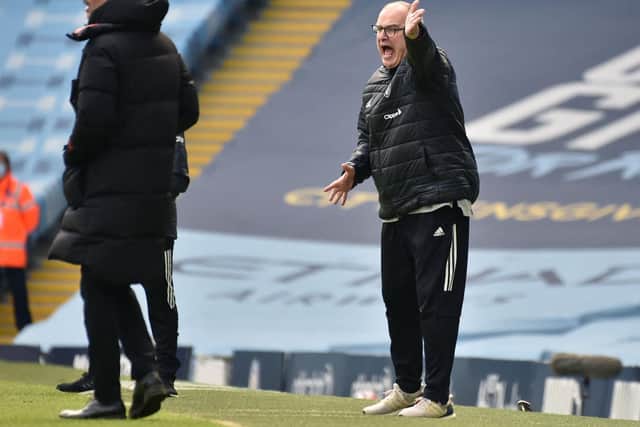 NOT THERE YET: Says Whites head coach Marcelo Bielsa, right, when it comes to competing with the division's big six as equals, despite taking four points off Manchester City and Pep Guardiola, left. Photo by RUI VIEIRA/POOL/AFP via Getty Images.