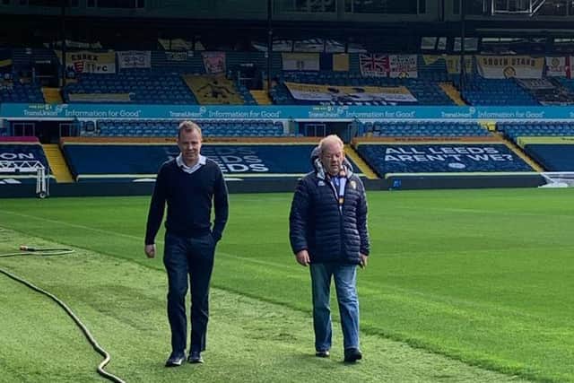 Angus Kinnear takes a local resident on a tour of Elland Road as part of the club's partnership with Holbeck Together.