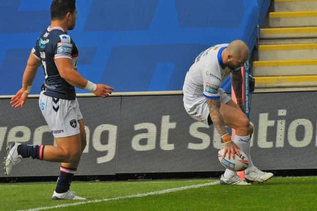 Luke Briscoe scores Rhinos' first try of the season, against Wakefield last month. Picture by Steve Riding.