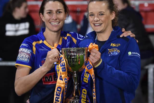 Courtney Winfield-Hill, left and Lois Forsell celebrate Rhinos' Grand Final win more than 550 days ago. Picture by Nathan Stirk/Getty Images.