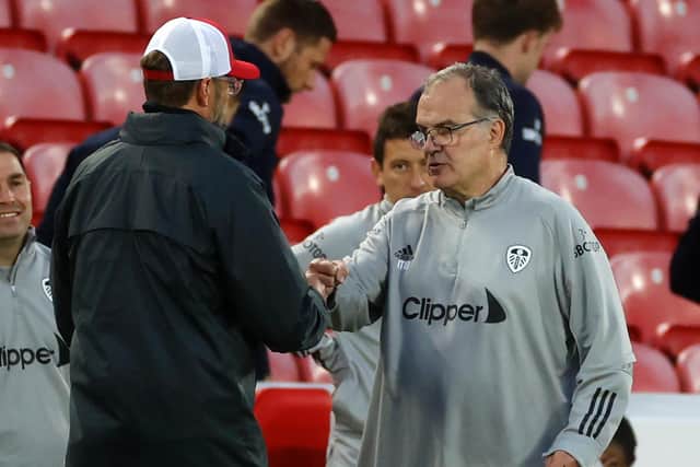 APPRECIATION: Between Leeds United head coach Marcelo Bielsa, right, and Liverpool boss Jurgen Klopp, for each other's work. The duo are pictured above after September's clash at Anfield. Photo by PHIL NOBLE/POOL/AFP via Getty Images.