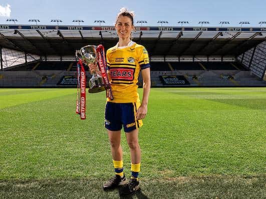 Rhinos captain Courtney Winfield-Hill with the Betfred Women's Super League trophy. Picture by Alex Whitehead/SWpix.com.