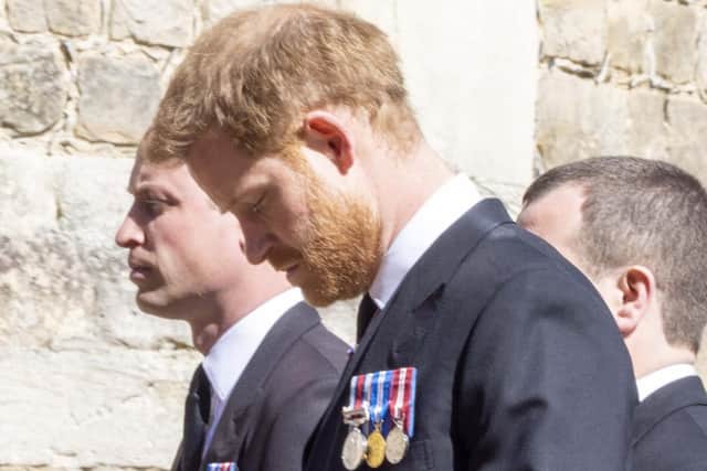 The Duke of Cambridge and the Duke of Sussex follow the Land Rover Defender carrying the Duke of Edinburgh's coffin during the funeral of the Duke of Edinburgh at Windsor Castle, Berkshire. Picture date: Saturday April 17, 2021.