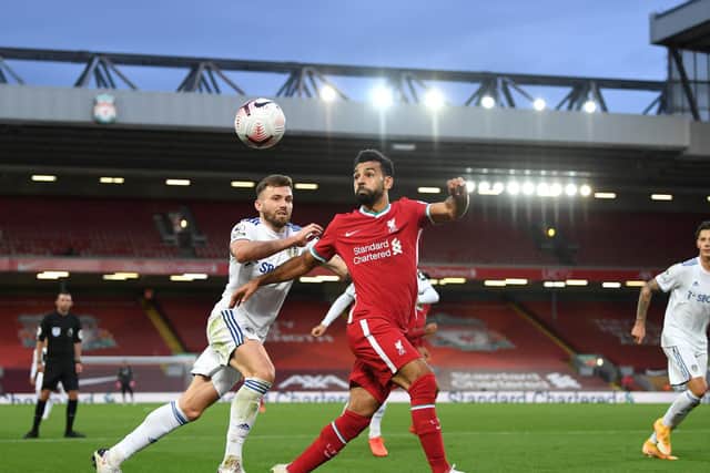 KEY PAIR: Liverpool striker Mo Salah, right, and thriving Leeds United midfielder Stuart Dallas, left, pictured during September's seven-goal thriller at Anfield. Photo by Shaun Botterill/Getty Images.