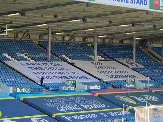 Leeds United unveil European Super League banner for Liverpool clash. Picture: Jonathan Buchan (BBC Radio Leeds)