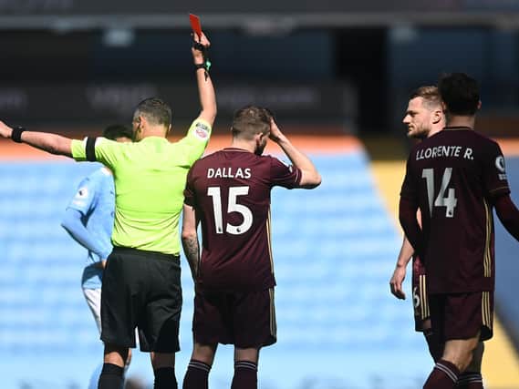'CALAMITOUS' CALL: Leeds United captain Liam Cooper is sent off in last weekend's 2-1 victory at Manchester City. Photo by Michael Regan/Getty Images.