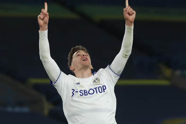 LANDMARK STRIKE: Leeds United's Diego Llorente celebrates his late equaliser. Photo by LEE SMITH/POOL/AFP via Getty Images.