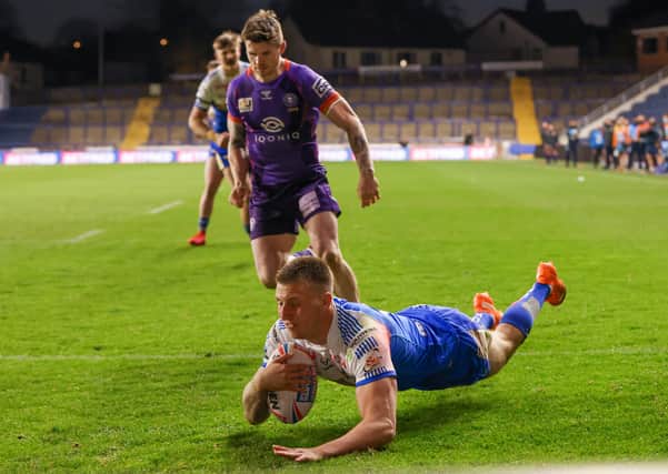 IN THE SPOTLIGHT: Leeds Rhinos' Alex Mellor touches down to scores against Wigan last week. Picture: Alex Whitehead/SWpix.com.