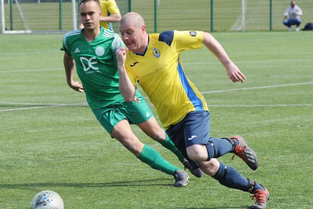 Ben Keedy, of Gildersome, takes on Matty James, of Mount St Marys. Picture: Steve Riding.