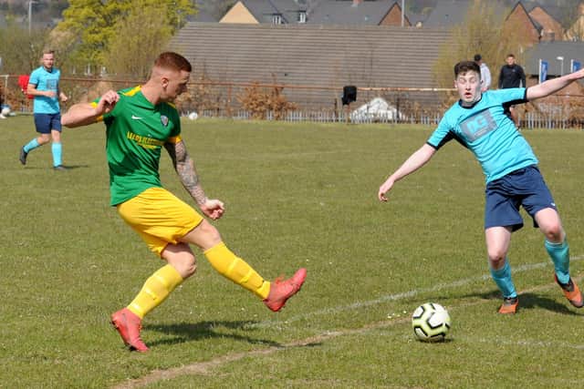 Joe Cryer scores his second goal for Main Line Social at Seacroft WMC. Picture: Steve Riding.